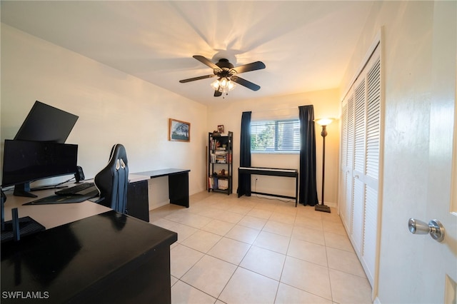 office space featuring light tile patterned floors and ceiling fan