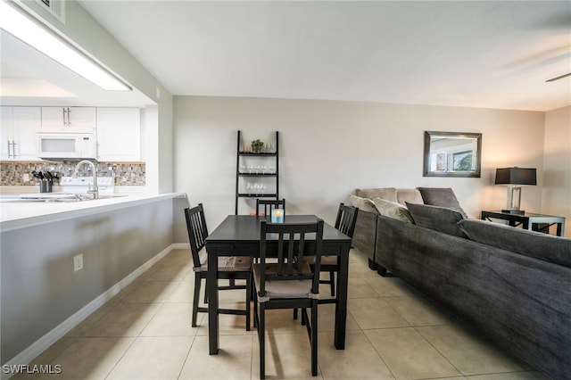 dining room with light tile patterned floors