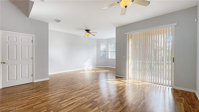 empty room featuring wood-type flooring