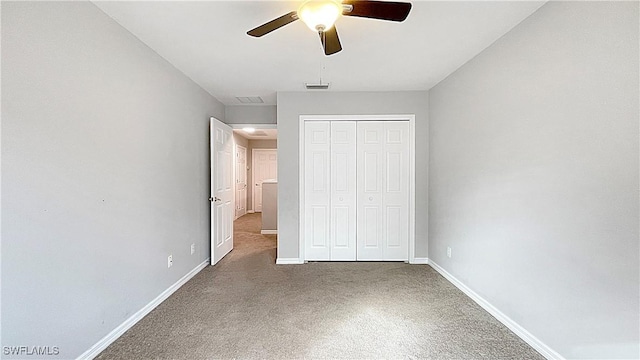 unfurnished bedroom with a closet and ceiling fan