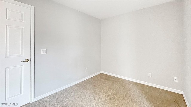 view of carpeted spare room