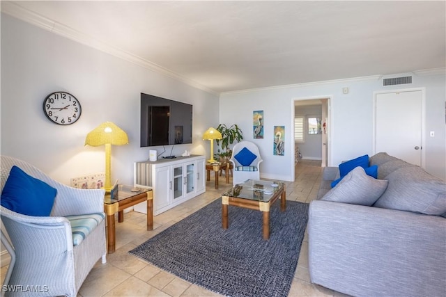 living room with light tile patterned floors and ornamental molding