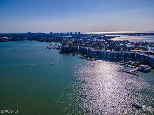 aerial view at dusk with a water view