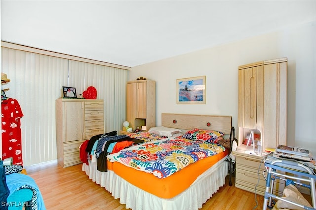 bedroom featuring light hardwood / wood-style floors