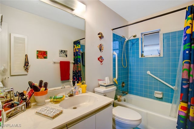 full bathroom with vanity, toilet, and shower / bath combo with shower curtain