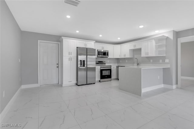 kitchen with marble finish floor, stainless steel appliances, light countertops, white cabinetry, and open shelves