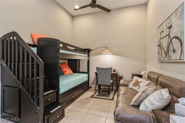 bedroom featuring ceiling fan and light tile patterned flooring