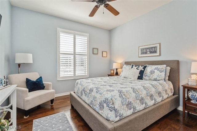 bedroom featuring ceiling fan and dark hardwood / wood-style floors