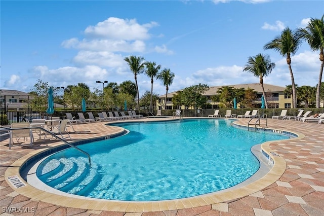 view of pool featuring a patio