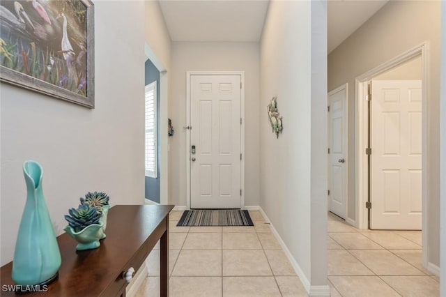 interior space featuring light tile patterned floors