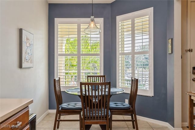 dining room with light tile patterned flooring