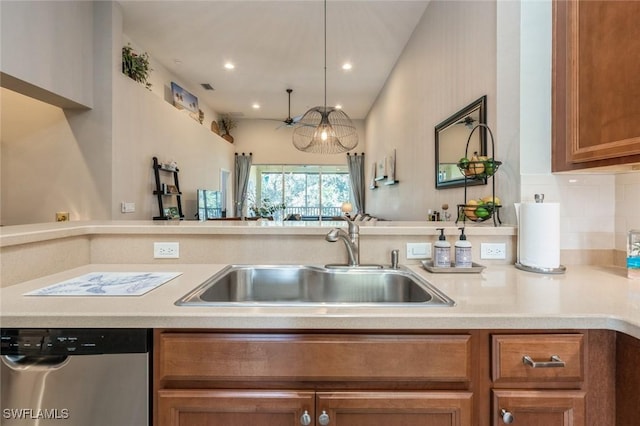 kitchen with dishwasher, sink, and pendant lighting