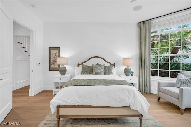 bedroom featuring light wood-type flooring