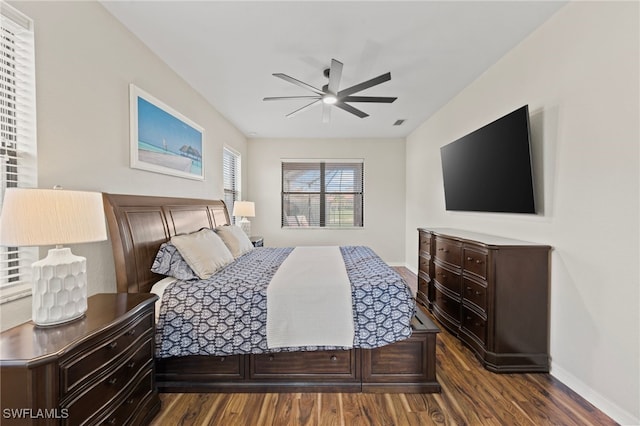 bedroom featuring dark wood-type flooring and ceiling fan