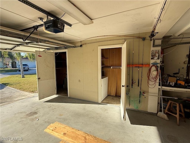 garage featuring a garage door opener