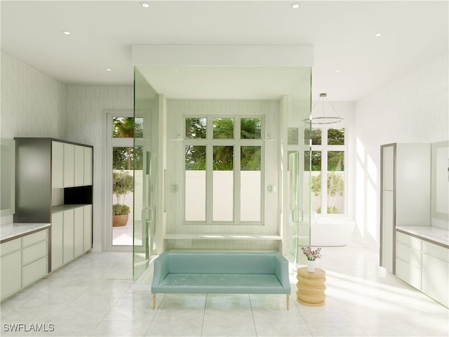 799 Cassena Rd, Naples, FL 34108 - full bathroom with a freestanding tub, vanity, and recessed lighting