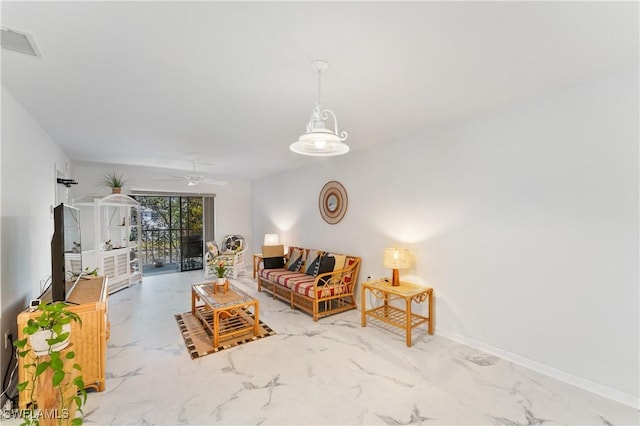 living room with ceiling fan