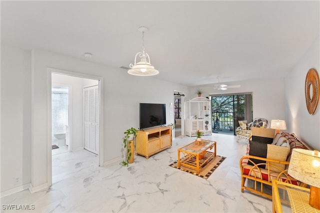 living room with ceiling fan