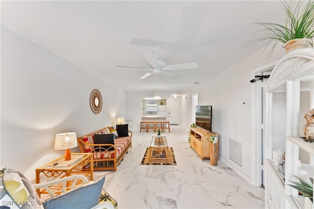 living room with ceiling fan