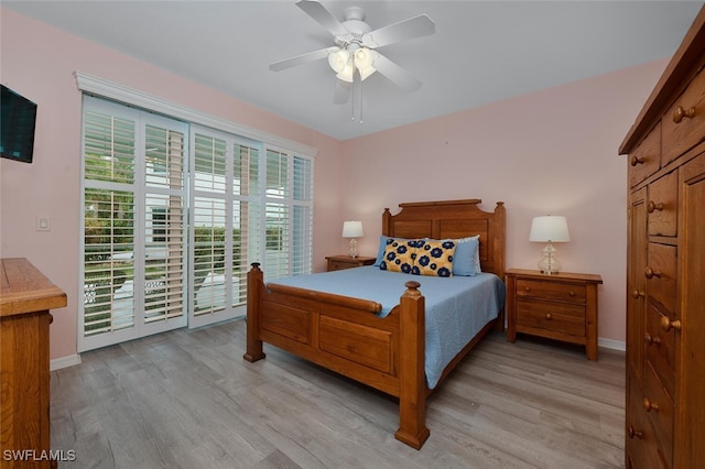 bedroom with ceiling fan, access to outside, and light hardwood / wood-style flooring