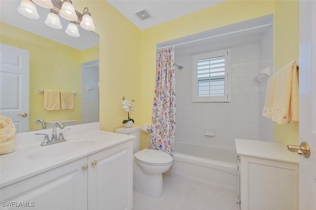 full bathroom featuring toilet, vanity, tile patterned flooring, and shower / tub combo