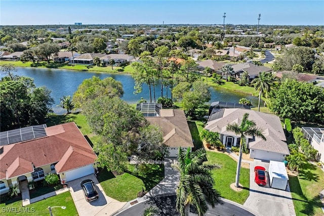 bird's eye view with a water view