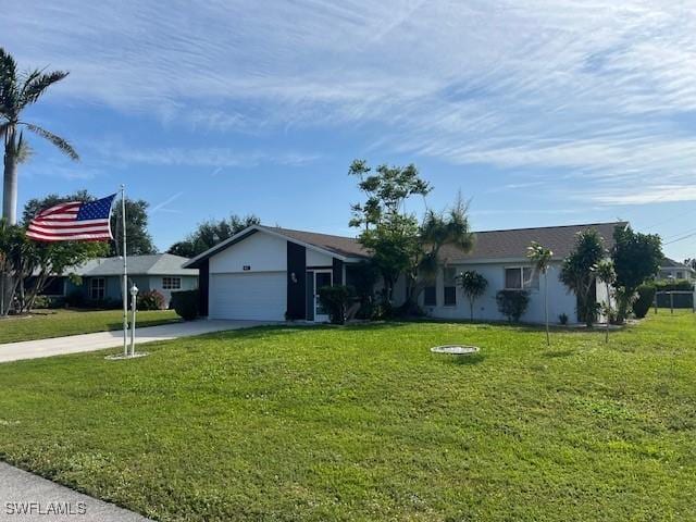 ranch-style home with a front yard and a garage