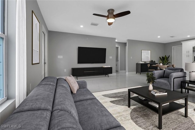 living room with ceiling fan