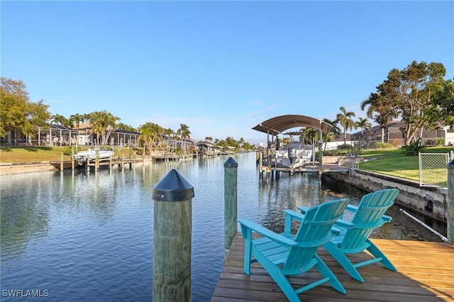 view of dock with a water view