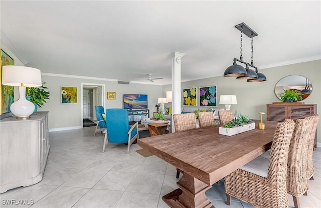 dining area featuring light tile patterned floors, a ceiling fan, visible vents, baseboards, and crown molding