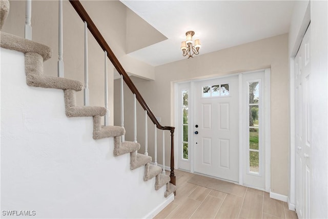 foyer with light hardwood / wood-style flooring