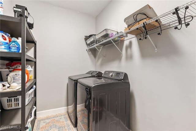 laundry area featuring washing machine and dryer