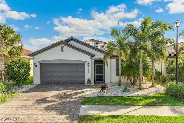 view of front of property featuring a garage