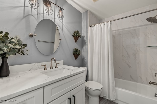 full bathroom with shower / tub combo, vanity, and toilet