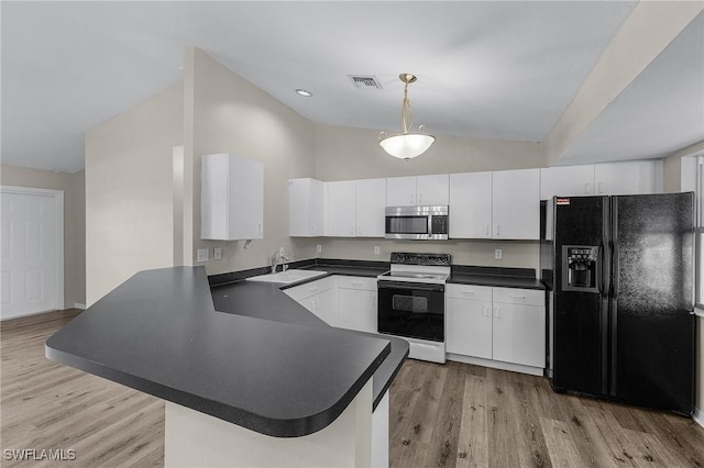 kitchen featuring white cabinetry, kitchen peninsula, white range with electric cooktop, decorative light fixtures, and black fridge with ice dispenser