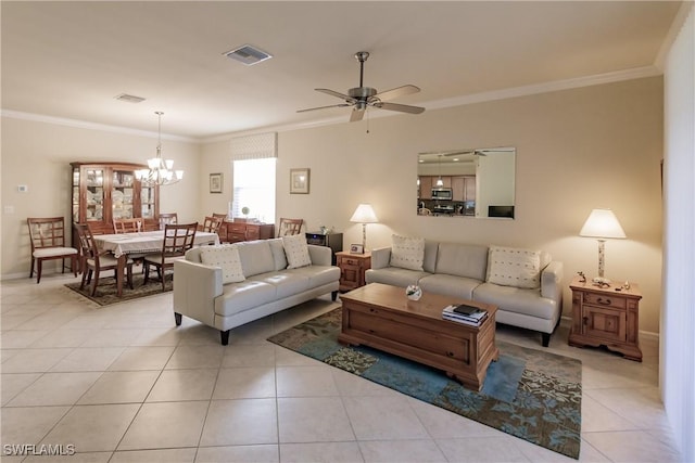 living room with light tile patterned flooring, ceiling fan with notable chandelier, and ornamental molding