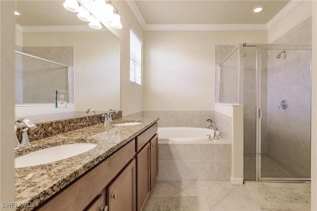 bathroom featuring tile patterned floors, vanity, separate shower and tub, and crown molding