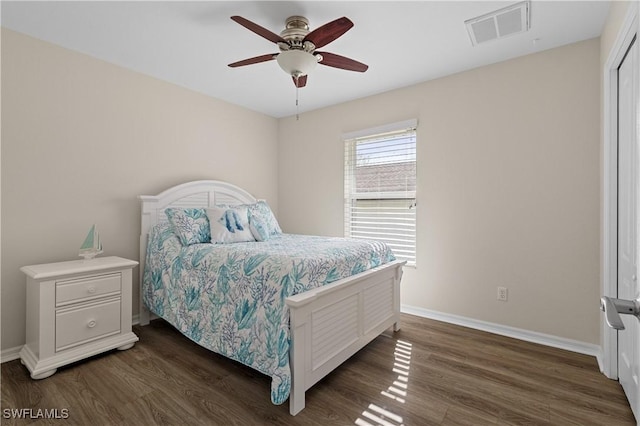 bedroom featuring ceiling fan and dark hardwood / wood-style floors