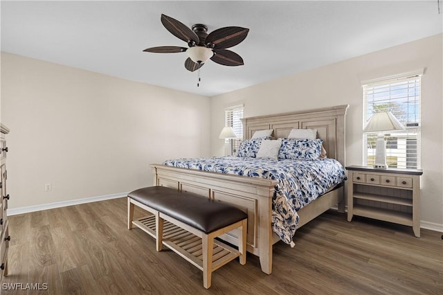 bedroom featuring ceiling fan and dark wood-type flooring