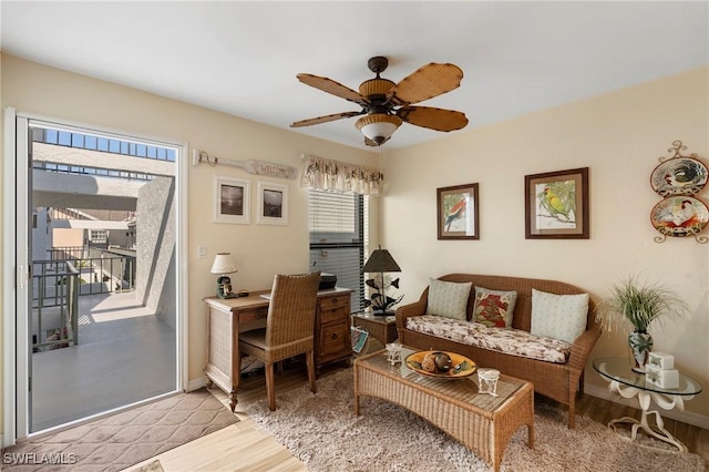 office space featuring light hardwood / wood-style flooring and ceiling fan