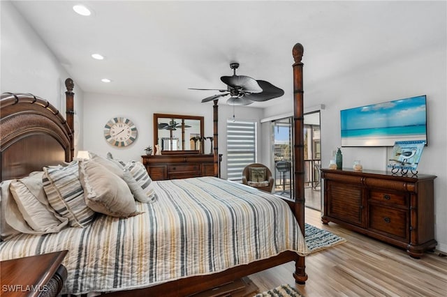 bedroom featuring light hardwood / wood-style flooring, access to outside, and ceiling fan