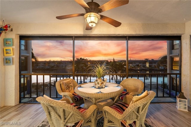 sunroom with a water view