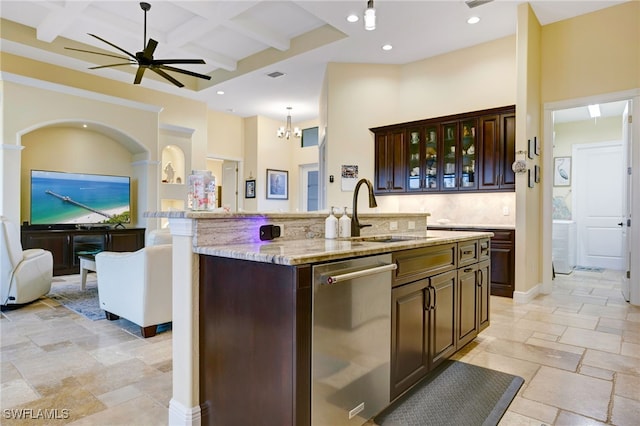 kitchen featuring dishwasher, sink, a center island with sink, beam ceiling, and coffered ceiling