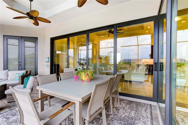 sunroom with a healthy amount of sunlight and french doors