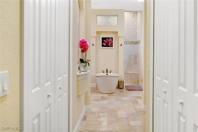 bathroom featuring a bathtub