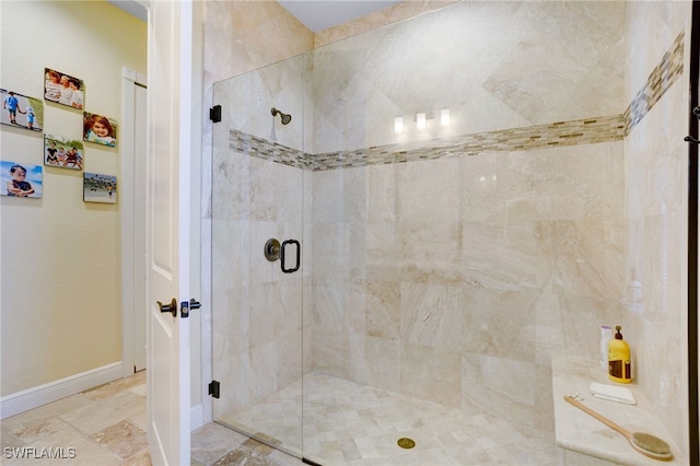 bathroom featuring an enclosed shower