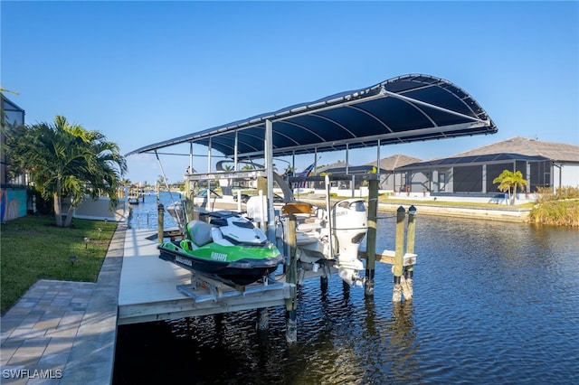 dock area featuring a water view