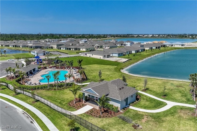 aerial view with a water view and a residential view