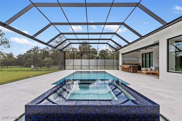 view of pool featuring a patio area, glass enclosure, an in ground hot tub, a bar, and an outdoor living space