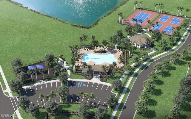 birds eye view of property with a water view